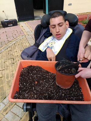 Manuel smelling the vinegar.