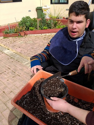 Manuel smelling the vinegar.